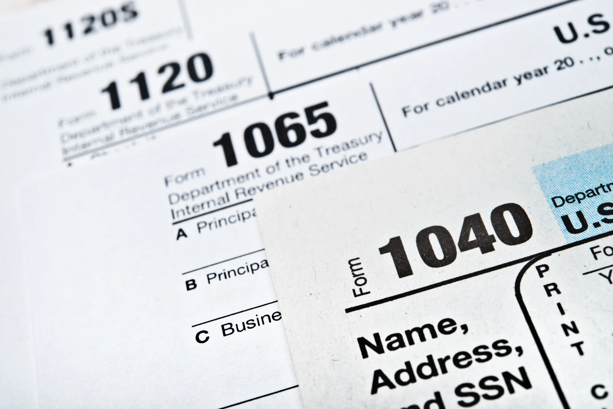IRS tax forms 1040, 1065, 1120 and 1120-S